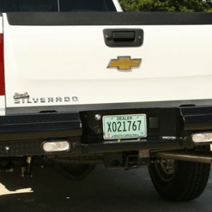Heavy-duty black bumper with integrated lights and step for easy access