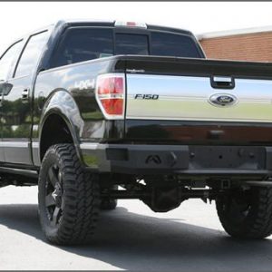 Ford black steel heavy duty rear Bumper with integrated lights and a textured step